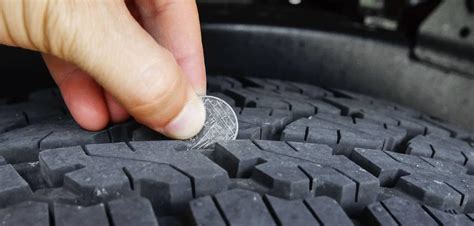 measure tire thickness with coin|how to measure tire tread depth.